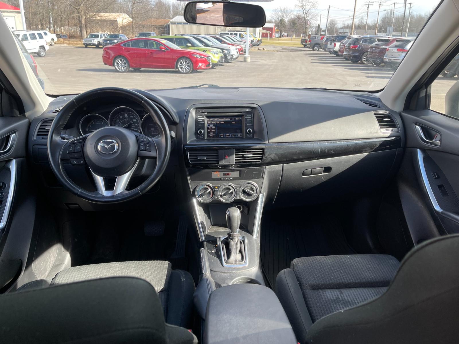 2015 White /Black Mazda CX-5 Touring AWD (JM3KE4CYXF0) with an 2.5L I4 DOHC 16V engine, 6-Speed Automatic transmission, located at 547 E. Main St., Orwell, OH, 44076, (440) 437-5893, 41.535435, -80.847855 - This 2015 Mazda CX-5 Touring AWD is a well-equipped SUV that offers a blend of performance, safety, and convenience for its drivers. Being a one-owner vehicle as per its Carfax report signifies well-attended maintenance and care. It is loaded with advanced features such as Blind Spot Monitoring and - Photo #34